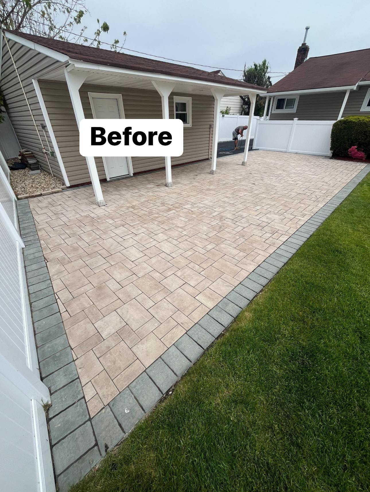 Before powerwashing: concrete surface with dirt and stains