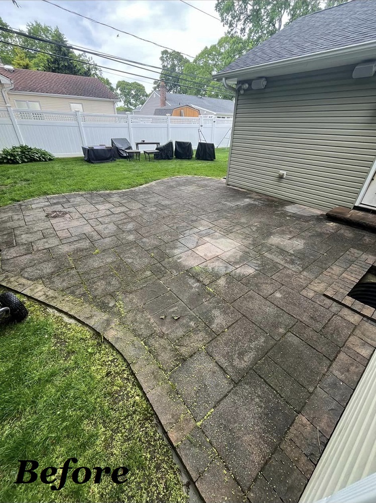 Before pressure washing looks dirty and overgrown