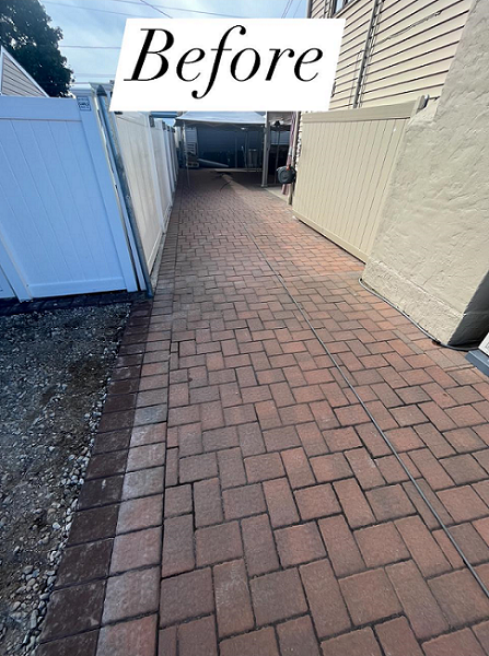 Before paver sealing, driveway looks dirty and dull