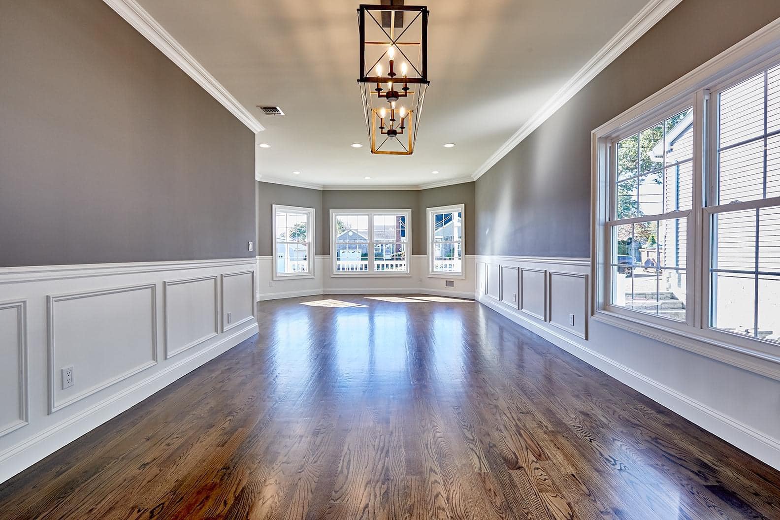 Living room with a cozy fireplace and large windows